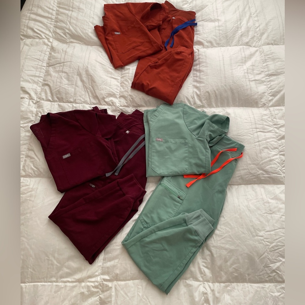 Set of Burgundy, Burnt Orange, and Sea Foam Green Scrubs.